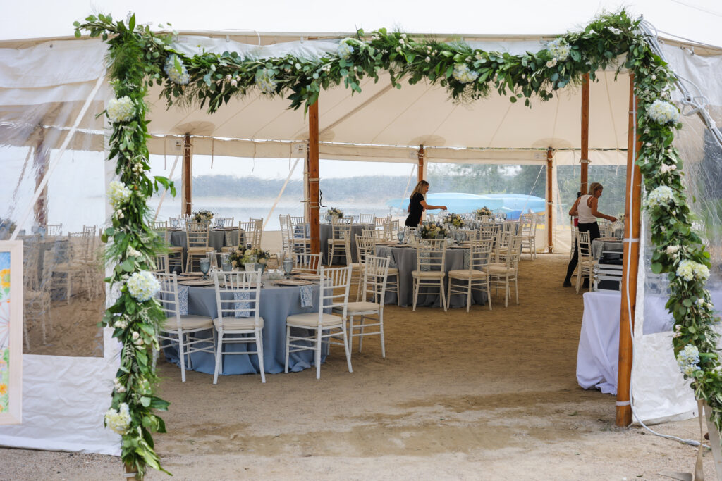 tented wedding reception on the beach at Chequessett Yacht and Country Club
